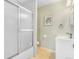 Bathroom with a shower-tub combination and modern fixtures at 4476 S Lincoln St, Englewood, CO 80113