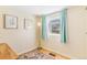 Bright bedroom with lots of natural light and decorative accents at 4476 S Lincoln St, Englewood, CO 80113