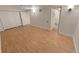 Basement featuring wood style flooring with access to the hallway at 3986 S Bahama St, Aurora, CO 80013