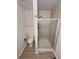 Bathroom featuring glass shower door, updated fixtures, and a modern toilet at 3986 S Bahama St, Aurora, CO 80013