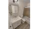 Bathroom featuring a standard toilet, vanity and a shower with glass doors at 3986 S Bahama St, Aurora, CO 80013