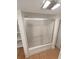 Bathroom features a shower and tub combination with glass sliding doors at 3986 S Bahama St, Aurora, CO 80013