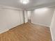 Bedroom featuring neutral paint, vinyl floors, a closet, and a bright ceiling light at 3986 S Bahama St, Aurora, CO 80013