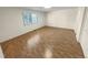 Bedroom with hardwood floors, plantation shutters, and closet space at 3986 S Bahama St, Aurora, CO 80013