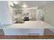 Open concept kitchen featuring white countertops and stainless steel appliances at 3986 S Bahama St, Aurora, CO 80013