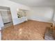 Spacious living room featuring hardwood floors and open access to the kitchen at 3986 S Bahama St, Aurora, CO 80013