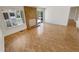 Bright and airy living room featuring wood floors and a cozy fireplace at 3986 S Bahama St, Aurora, CO 80013