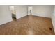 Main bedroom with hardwood floors, closet and access to the bathroom at 3986 S Bahama St, Aurora, CO 80013