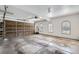Spacious three car garage with ample storage space and natural light at 9552 E Silent Hills Pl, Lone Tree, CO 80124
