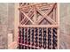 Elegant wine cellar with wooden racks, beautifully displaying an extensive collection of wines at 9552 E Silent Hills Pl, Lone Tree, CO 80124