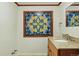 Bathroom featuring a decorative glass window and granite countertops at 10849 E Crestridge Cir, Englewood, CO 80111