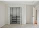 Bedroom closet with adjustable shelving and organizational baskets at 10849 E Crestridge Cir, Englewood, CO 80111