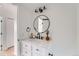 A modern bathroom featuring black hardware and white cabinets at 4294 S Salida Way # 4, Aurora, CO 80013