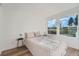 Bright bedroom featuring wood floors and a view of the outdoors from the double window at 4294 S Salida Way # 4, Aurora, CO 80013