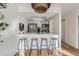 Kitchen with barstool seating features stainless steel appliances and opens into the living area at 4294 S Salida Way # 4, Aurora, CO 80013