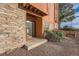 Cozy patio featuring a sliding glass door and a combination of stone and wood exterior at 4294 S Salida Way # 4, Aurora, CO 80013