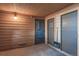 Enclosed porch area with wood paneling and doors at 4294 S Salida Way # 4, Aurora, CO 80013