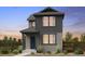 Charming two-story home with a covered porch, neutral siding, and a well-manicured front yard at 14877 Arbor W Blvd, Thornton, CO 80602