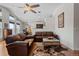 Comfortable living room featuring hardwood floors, stylish decor, and a cozy seating arrangement at 20290 Doewood Dr, Monument, CO 80132