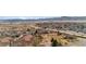 Scenic aerial view capturing a well-maintained community with beautiful surroundings and distant mountains at 8422 S Upham Way # G47, Littleton, CO 80128