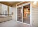 Spacious balcony with sliding glass door access, showcasing an open layout with ample natural light at 8422 S Upham Way # G47, Littleton, CO 80128