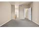 Spacious bedroom with neutral carpeting and two door openings at 8422 S Upham Way # G47, Littleton, CO 80128