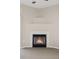 Comfortable living space with a charming fireplace featuring a tile surround and neutral accents at 8422 S Upham Way # G47, Littleton, CO 80128