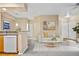 Comfortable living room with kitchen and dining area featuring plush seating, and modern decor at 8422 S Upham Way # G47, Littleton, CO 80128