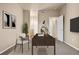 Well-lit home office with ample workspace, neutral tones, and stylish decor for productivity at 8422 S Upham Way # G47, Littleton, CO 80128