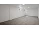 Bright, spacious finished basement with neutral carpeting and recessed lighting at 34 University Dr, Longmont, CO 80503