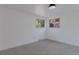 Spacious bedroom with neutral walls and carpet at 34 University Dr, Longmont, CO 80503