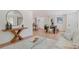 Bright living room with hardwood floors, large windows and modern furniture at 34 University Dr, Longmont, CO 80503
