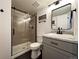 Updated bathroom with gray tile shower and vanity at 245 Dunhill St, Castle Rock, CO 80104