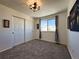 Bright bedroom with double doors and carpet at 245 Dunhill St, Castle Rock, CO 80104