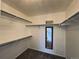 Large walk-in closet with ample shelving and hanging space at 245 Dunhill St, Castle Rock, CO 80104