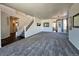 Spacious living room with carpeted floors and lots of natural light at 245 Dunhill St, Castle Rock, CO 80104