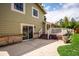 Back exterior view of home with deck and patio at 7863 W Quarto Ave, Littleton, CO 80128