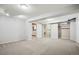 A finished basement area includes a laundry space and closet for extra storage at 7863 W Quarto Ave, Littleton, CO 80128