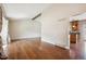 Spacious living room with high ceilings, hardwood floors, and natural light, ideal for entertaining at 7863 W Quarto Ave, Littleton, CO 80128