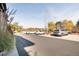 Parking lot with landscaping at 155 S Monaco Pkwy # 302, Denver, CO 80224