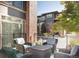 Patio furniture on a brick patio at 155 S Monaco Pkwy # 302, Denver, CO 80224