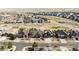 An aerial view of a neighborhood with well-maintained homes and green spaces in a beautiful community at 27485 E Nova Pl, Aurora, CO 80016