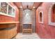 Wine cellar with brick floor, wine racks, and wood accents, perfect for the wine enthusiast at 27485 E Nova Pl, Aurora, CO 80016