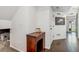 Hallway with hardwood flooring and desk space at 10560 Waco St, Commerce City, CO 80022