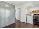 Laundry room area with washer and dryer and storage cabinets at 10560 Waco St, Commerce City, CO 80022