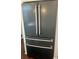Stylish matte black refrigerator with sleek handles adding sophistication to the kitchen at 10560 Waco St, Commerce City, CO 80022