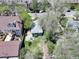 Aerial view of the home showcasing its location in a residential neighborhood with mature trees and well-kept yards at 150 S Garfield St, Denver, CO 80209