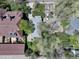 Birds eye view of house with backyard patio surrounded by mature trees showcasing peaceful setting at 150 S Garfield St, Denver, CO 80209
