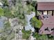 Charming home featuring a well-maintained yard with mature trees and driveway at 150 S Garfield St, Denver, CO 80209