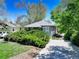 Charming home with a well-manicured front yard and a cozy, inviting exterior at 150 S Garfield St, Denver, CO 80209